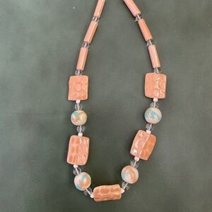 Ceramic statement necklace, peach, light blue, cream, 10” long.